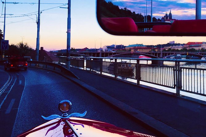 1,5 hour oldtimer convertible Prague sightseeing tour - Wenceslas Square, National Theatre, and synagogue-era stops