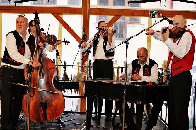 Czech Traditional Folklore Show including Dinner and Transport - The Folk Show: String Musicians, Costume Dancing, and Audience Participation