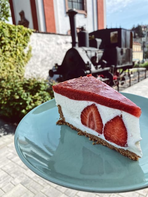 From Prague: Terezin Camp and Bohemian Switzerland Day Trip - Litoměřice Retro Café Break: Coffee, Cakes, and a Med-Town Bonus