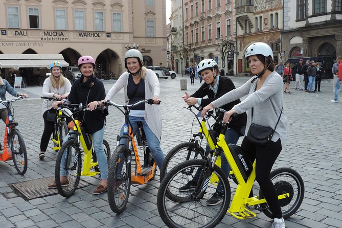Grand City Tour of Prague on Cruiser e-Bikes or e-Scooters - Kampa Island and John Lennon Wall: quirky stops with atmosphere