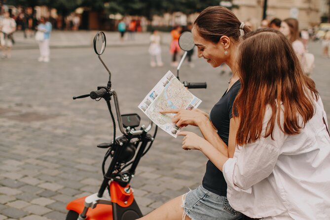 Guided sightseeing e-scooter tour of Prague: 2 hours - National Theater and the final fountain square finish