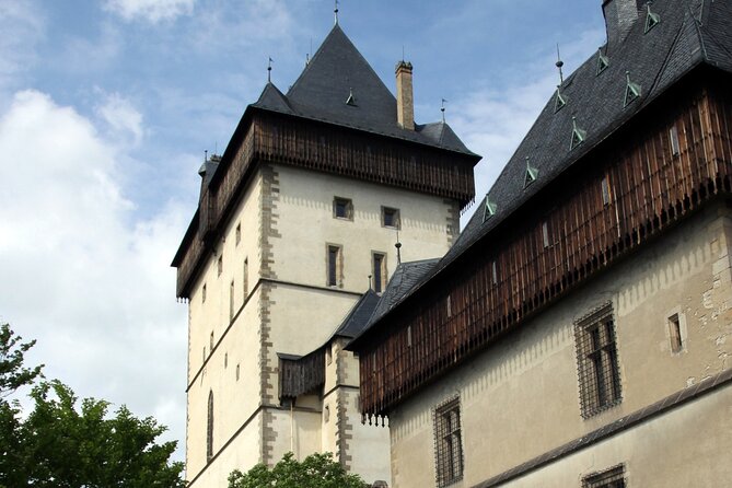 Karlstejn Castle in Vintage Convertible Car - Weather Matters More Than You Think for a Convertible Ride