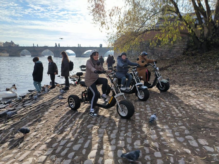 Prague: 2-Hour Trike Live Guided Tour of Old Town - From the Embassy of Japan to a helmeted start