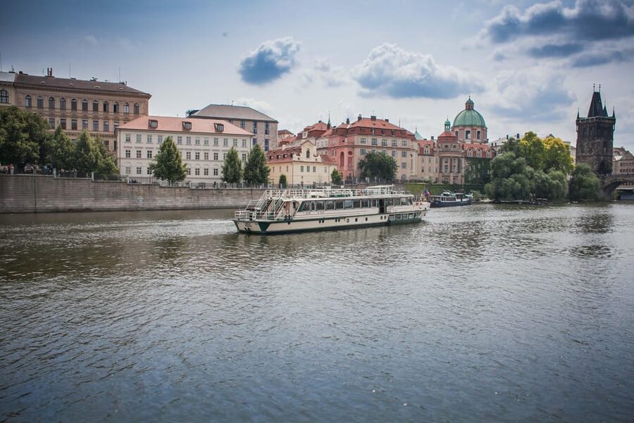 Prague: An unforgettable 2-hour cruise on the Vltava River. - Prague Castle towering above the water