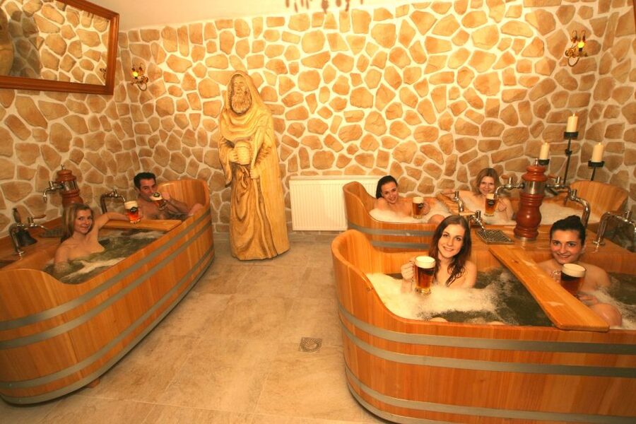 Prague: Beer Spa Bernard with Beer and Massage Option - The beer bath ritual: warmth, Bernard, and the Middle Ages claim