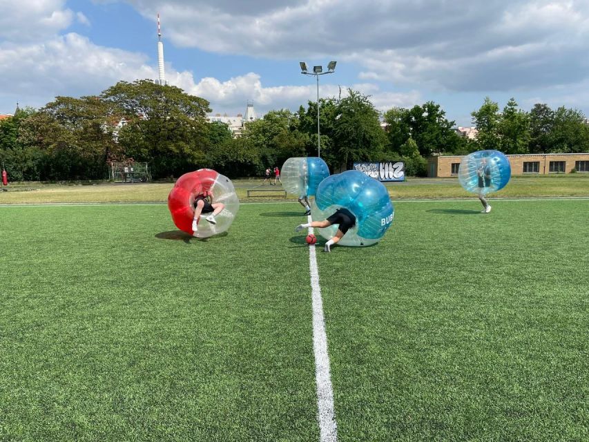 Prague: Bubbles football - Zorb Football in centrum - Stretch, rules, and knee protection before the fun starts