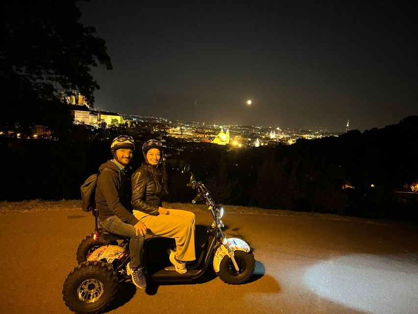 Prague City sightseeing in Night Trike Tour - Passing the Prague Castle main entrance area, then Strahov Monastery