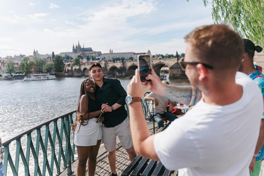 Prague: Full-Day Old Town, River Cruise & Prague Castle Tour - Prague Castle grounds and exteriors, from medieval roots to 1989 and modern democracy