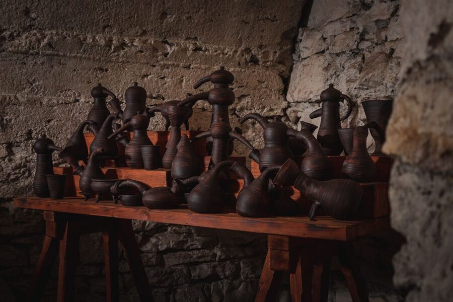 Prague: Ghosts, Legends, Medieval Underground & Dungeon Tour - Meeting at the Art Passage near Black Angels Bar