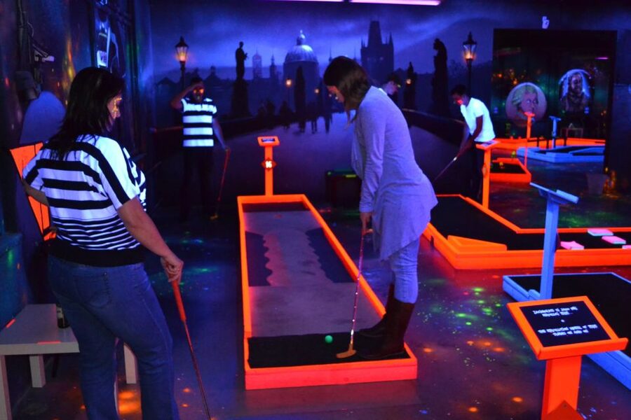 Prague: Glow Golf Mini Golf Game by UV Light - How the Prague Themes Show Up on the Course