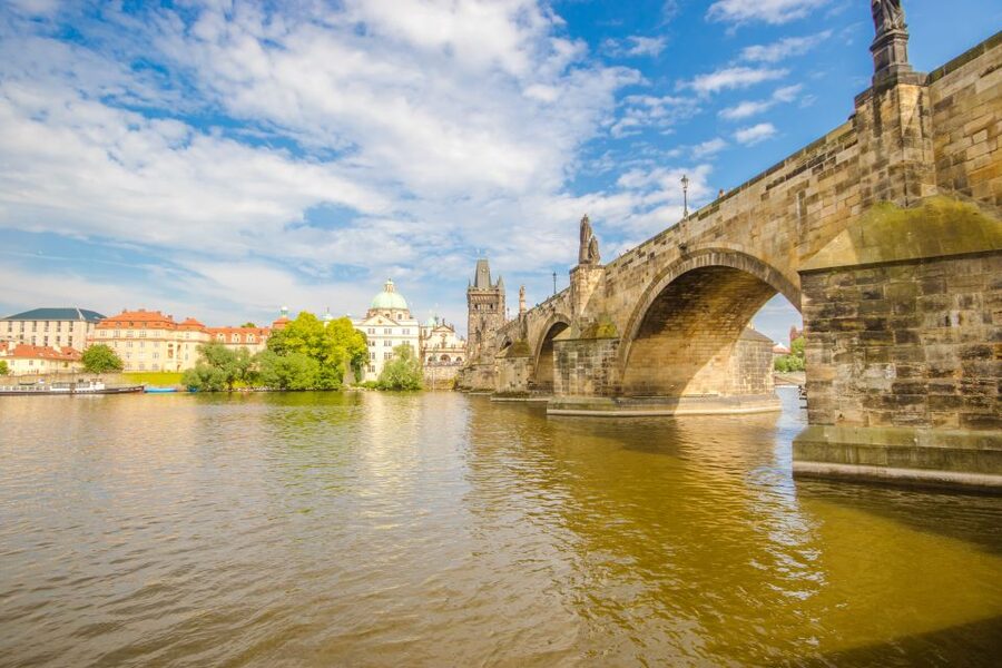 Prague: Guided Bus & Walking Tour with River Cruise & Lunch - The bus loop: National Museum, Dancing House, Charles Bridge, and more