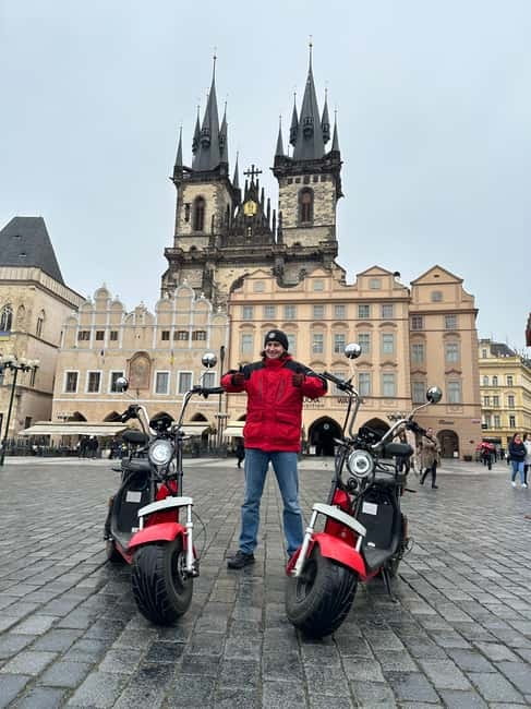 Prague: Guided Fat Tire e-Scooter Tour - Along the river: Kampa Park, Charles Bridge views, and National Theater