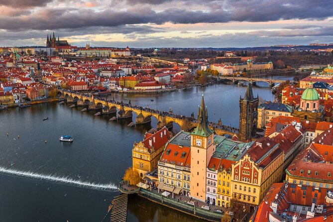 Prague Guided Walking Tour and Cruise with Authentic Czech Lunch - Prague Castle grounds in about an hour, with St. Vitus Cathedral as the anchor