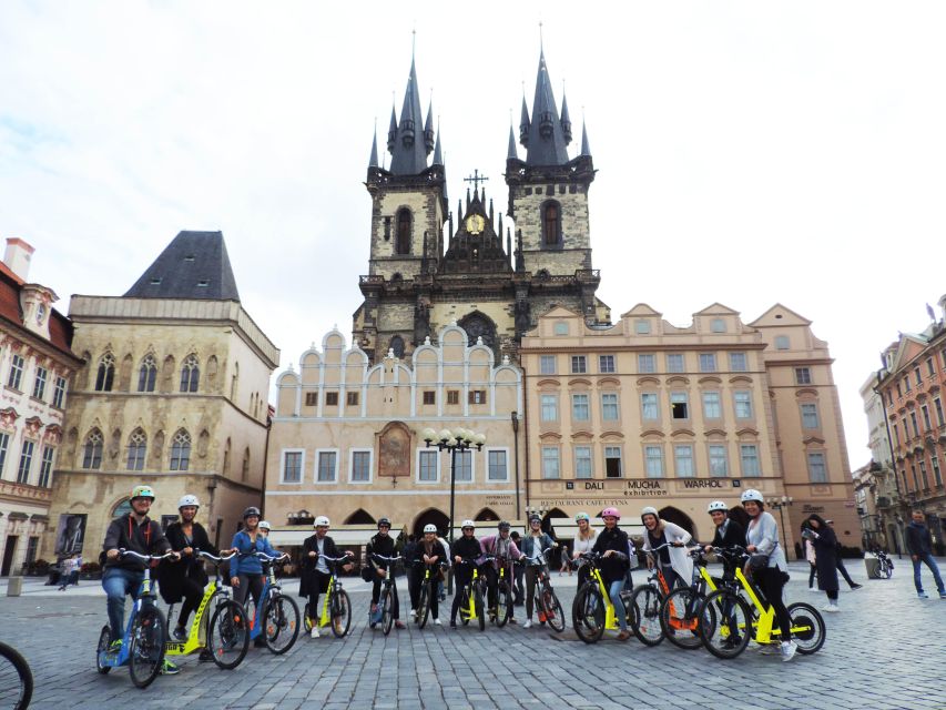 Prague: Highlights Tour on e-Scooter or eBike - Charles Bridge, the narrowest street, and Old Town Square photo time