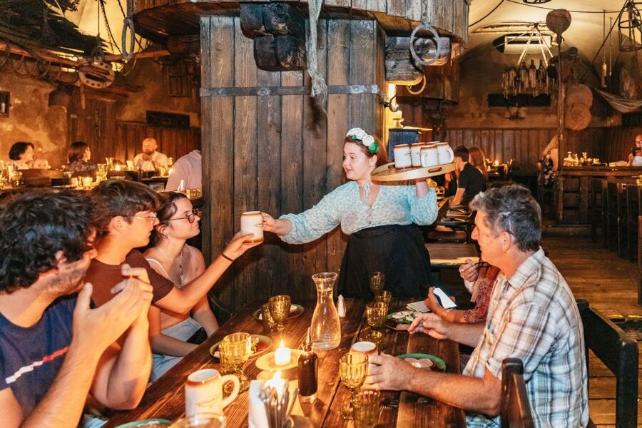 Prague: Medieval Dinner with Unlimited Drinks - The medieval show: swordsmen, jugglers, belly dancers, and crowd energy