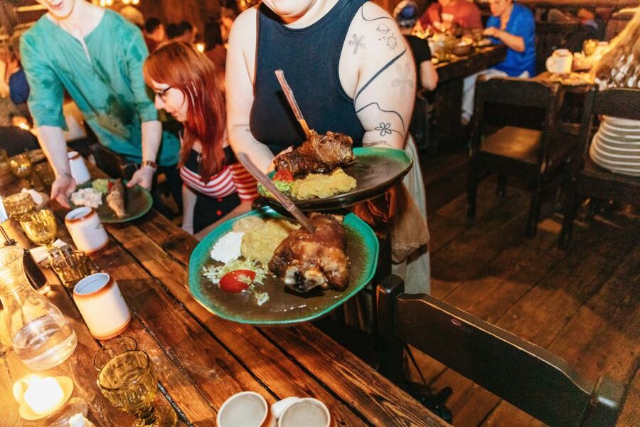 Prague: Medieval Dinner with Unlimited Drinks - Sharing a table in a packed medieval hall