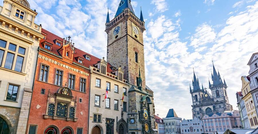 Prague: Old Town Guided Walking Tour and City Boat Ride - Old Town Square meetup at Cartier, then you’re already in the story