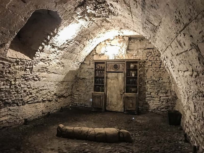 Prague: Oldtown, Medieval Underground & Dungeon History Tour - Going down into medieval cellars and corridors