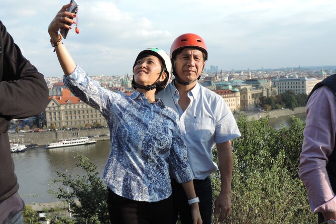 Prague Panoramic Views e-bike and e-Scooter guided Tour - John Lennon Wall at Lennonova zed, then Charles Bridge photo time