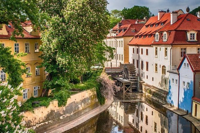 Prague's charming old places tour in Russian language - Charles Bridge crossing, then down to Kampa’s different world
