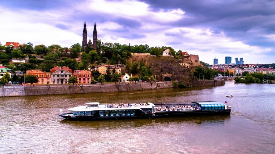 Prague: Sightseeing Dinner Cruise on Open-Top Glass Boat - A 3-hour Prague night cruise that mixes sightseeing with a real meal