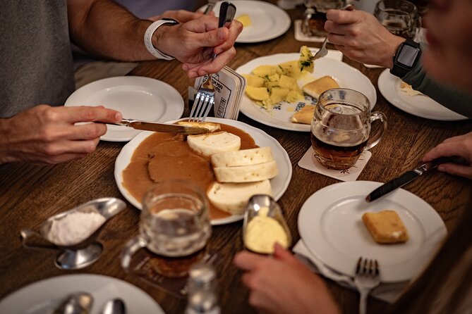 Prague Snack & Stroll: Private Food Tour with Your Local Buddy - Karlín Square: flood history, then food culture