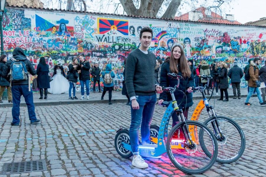 Prague: Tour by Electric Scooter or Cruiser eBike - John Lennon Wall and the Kafka Museum stop that sets the tone