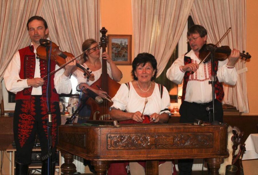 Prague: Traditional Folklore Evening with Dinner & Music - Pickup and the Short Ride Through Historic Prague