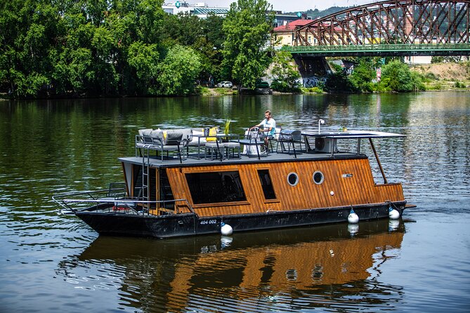 Prague YachtBoat CLASSIC cruise with Unlimited Beer or Prosecco - The Vltava “greatest hits” stretch: Dancing House, National Theatre, and castle views