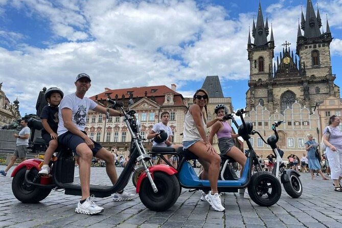 Private live-guided E-Scooter TOURS around Prague - Old Town Square: Astronomical Clock, Týn Church, and Jan Hus