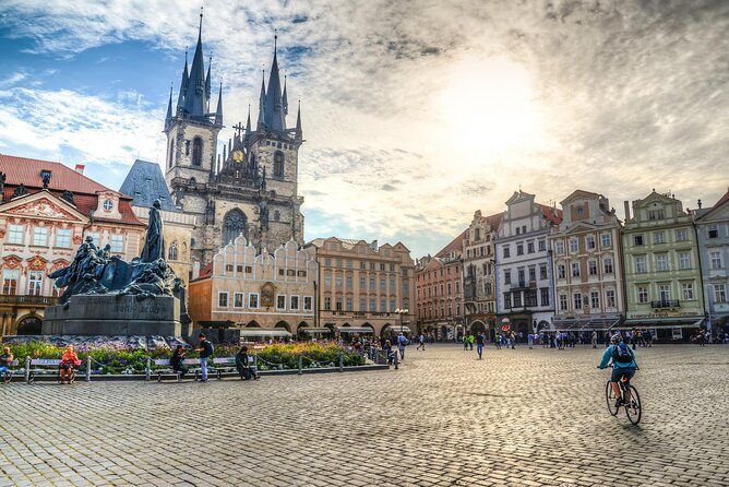 Private Prague City Highlights Tour with a Stop at a Czech Cafe - Gothic gate tower, a Cinderella-shaped church moment, and the peace graffiti detour