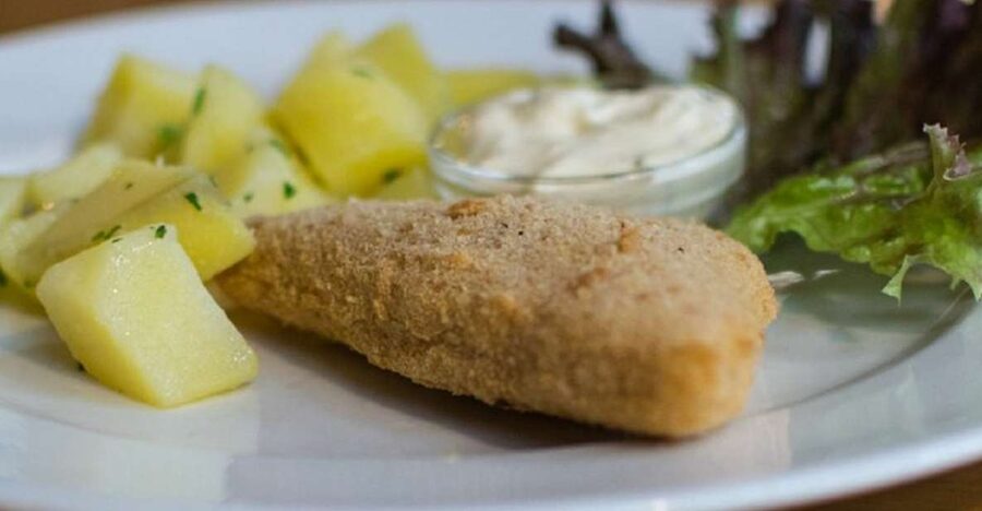 Secret walking Food Tour Prague - Stop 1 at a traditional deli for chlebíčky