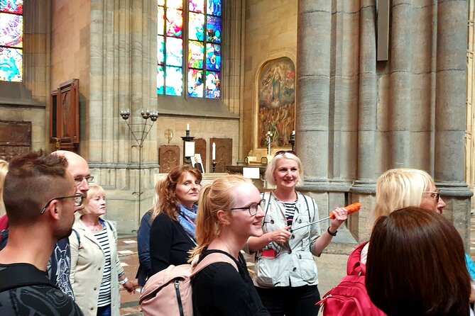 Skip the line: Prague Castle Interiors Tour with Local Guide - St. George’s Basilica: stone calm, fresco fragments, and St. Ludmila