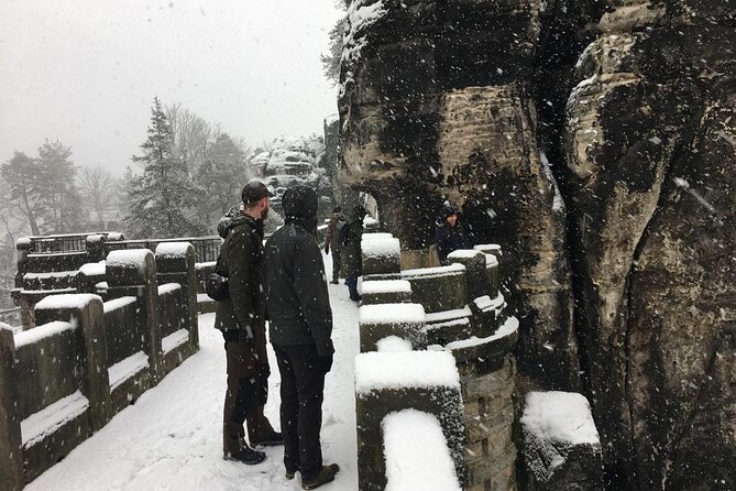 Winterland Tour to Bohemian and Saxon Switzerland from Prague - Tisá Rocks: narrow passages, careful steps, and Narnia vibes